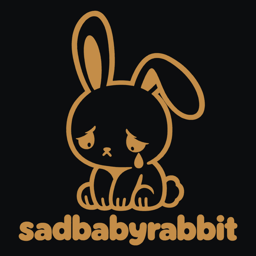 The sadbabyrabbit line drawing that is etched into the back of the board as bare copper